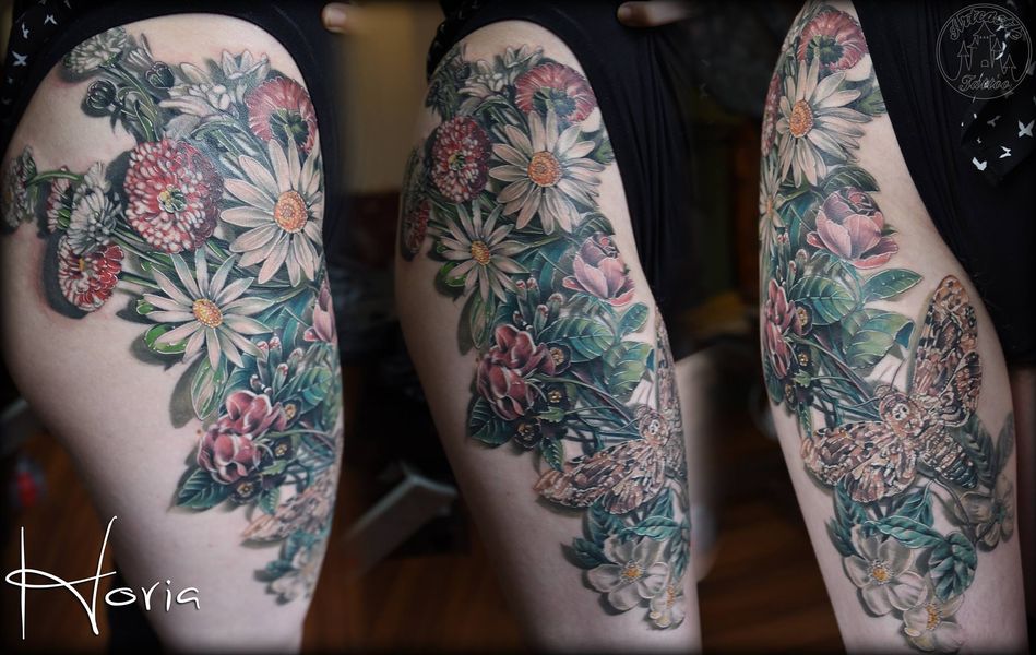 ArtCastleTattoo Tattoo ArtiestPrive Horia Color realism flowers with moth tattoo upper leg healed Color