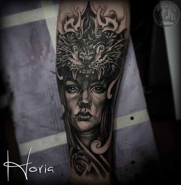 ArtCastleTattoo Tattoo ArtiestPrive Horia Realistic Womans portrait tattoo with tiger lower arm Black n Grey