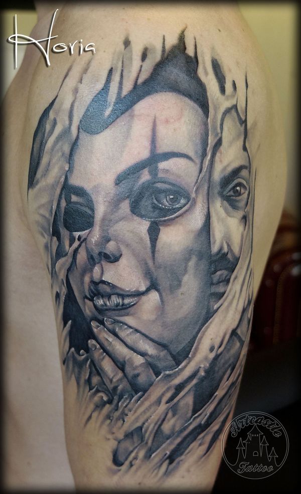 ArtCastleTattoo Tattoo ArtiestPrive Horia Relaistic man portrait with a Mask with ripped Flesh black n grey upper arm Black n Grey